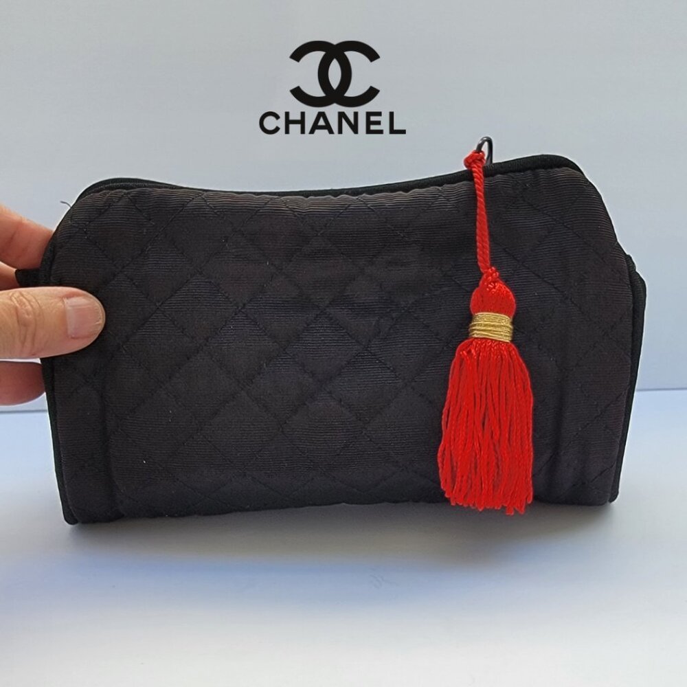 CHANEL black quilted makeup bag with red tassle, Beaute collection, NY, NY
